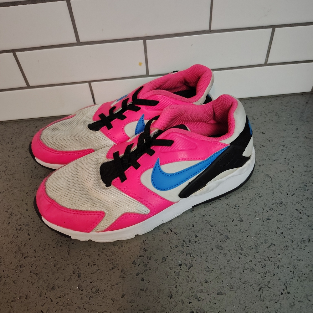 Nike Pink and Blue Sneakers Retro-Inspired Design